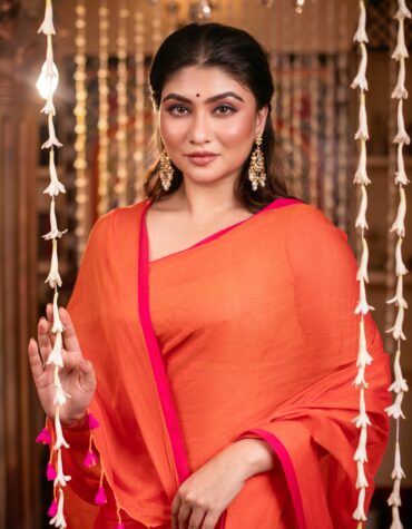 Vibrant Orange Pure Mul Cotton Saree with Hot Pink Piping & Tassels – Breezy Festive Wear | Sutayan