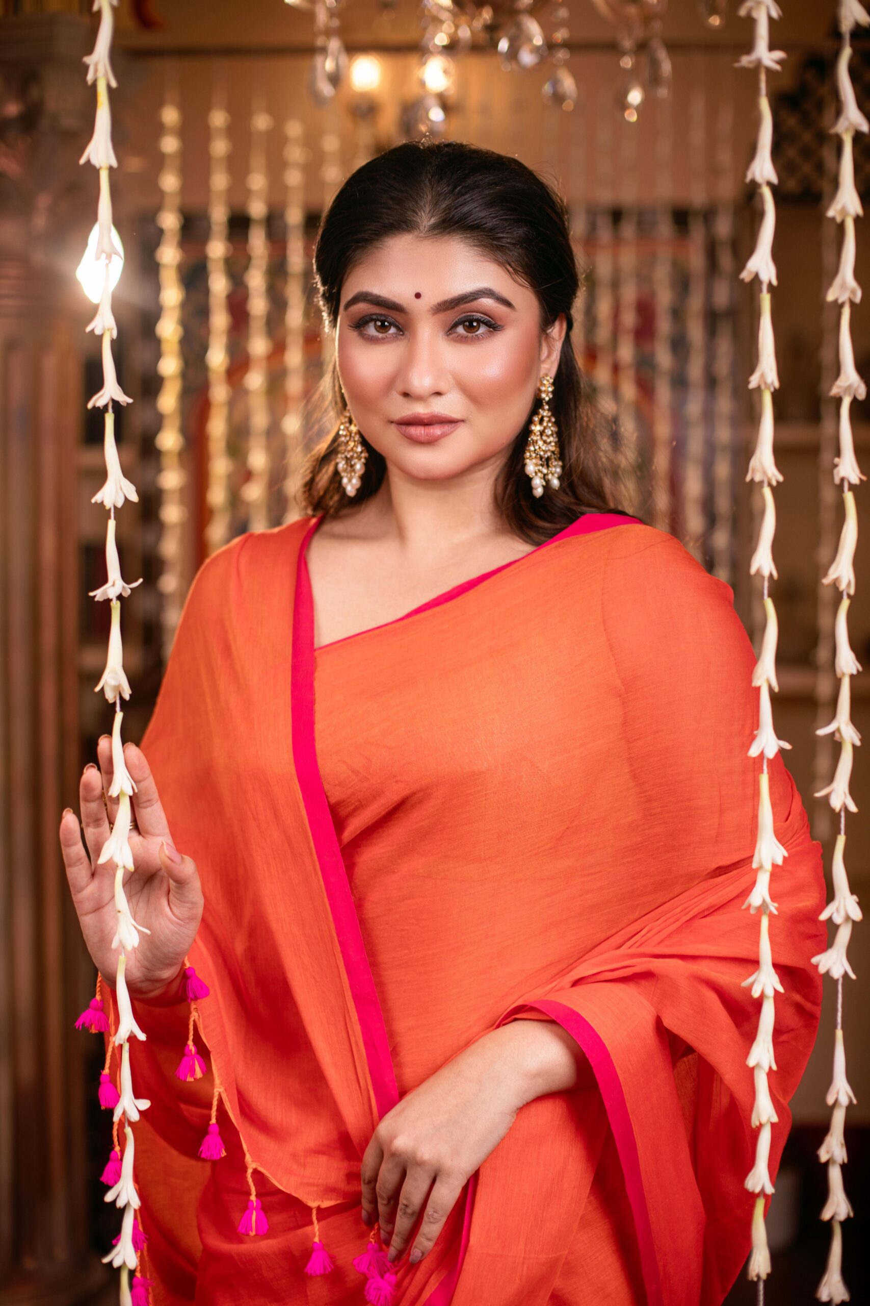 Vibrant Orange Pure Mul Cotton Saree with Hot Pink Piping & Tassels – Breezy Festive Wear | Sutayan