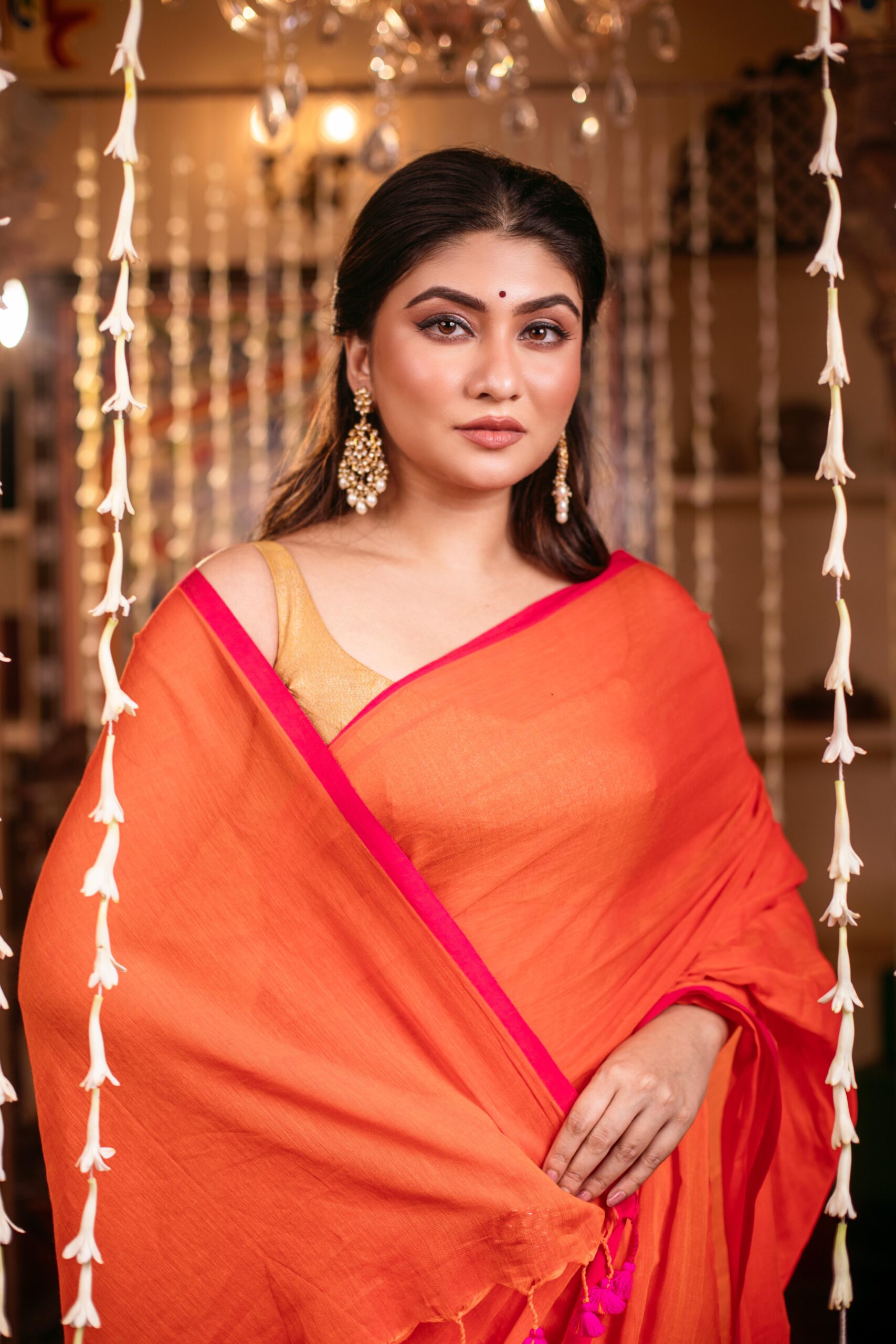 Vibrant Orange Pure Mul Cotton Saree with Hot Pink Piping & Tassels – Breezy Festive Wear | Sutayan