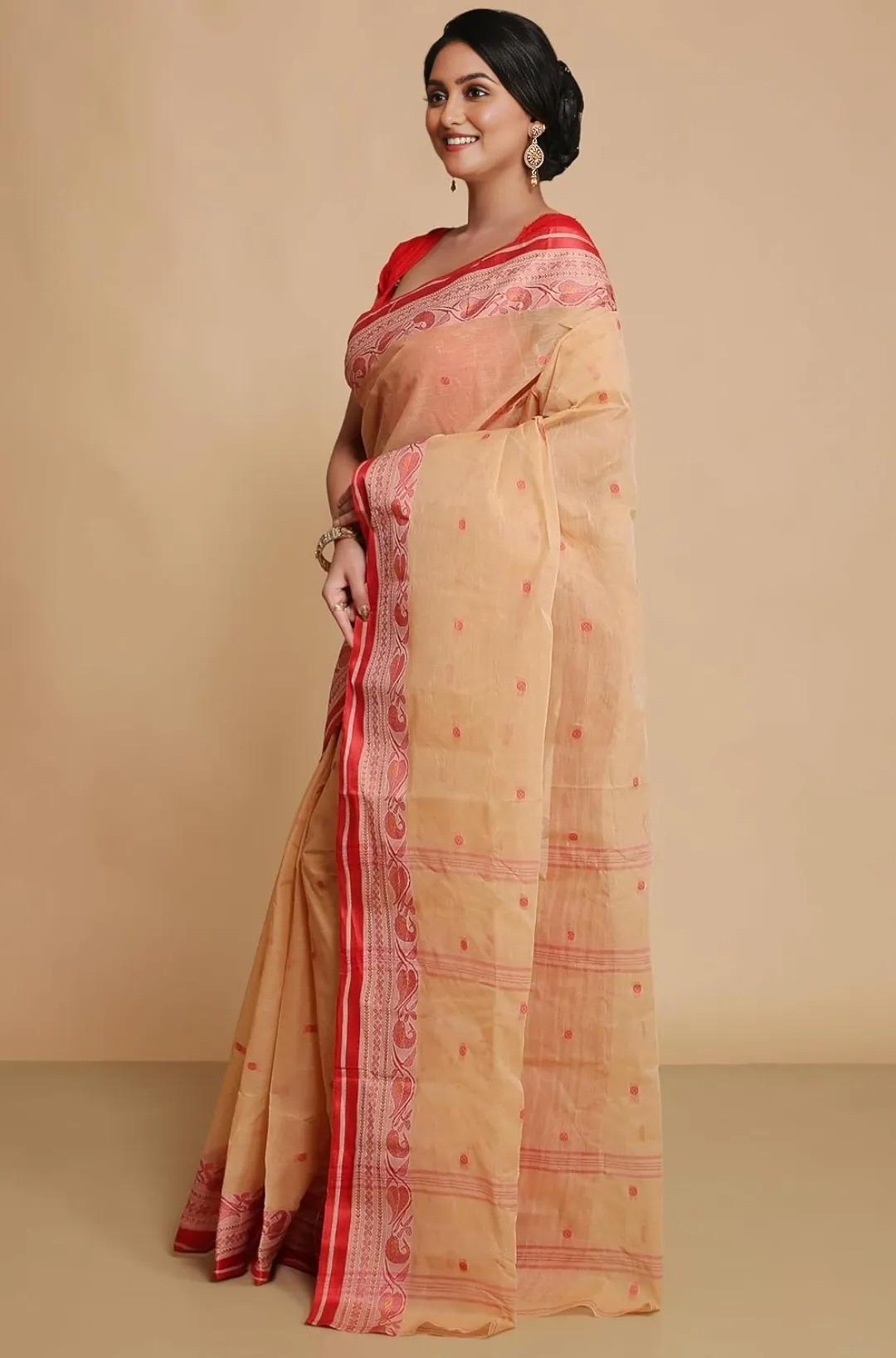 Classic Peach-Beige Tant Saree with Traditional Red Woven Border – Pure Handloom Cotton | Sutayan