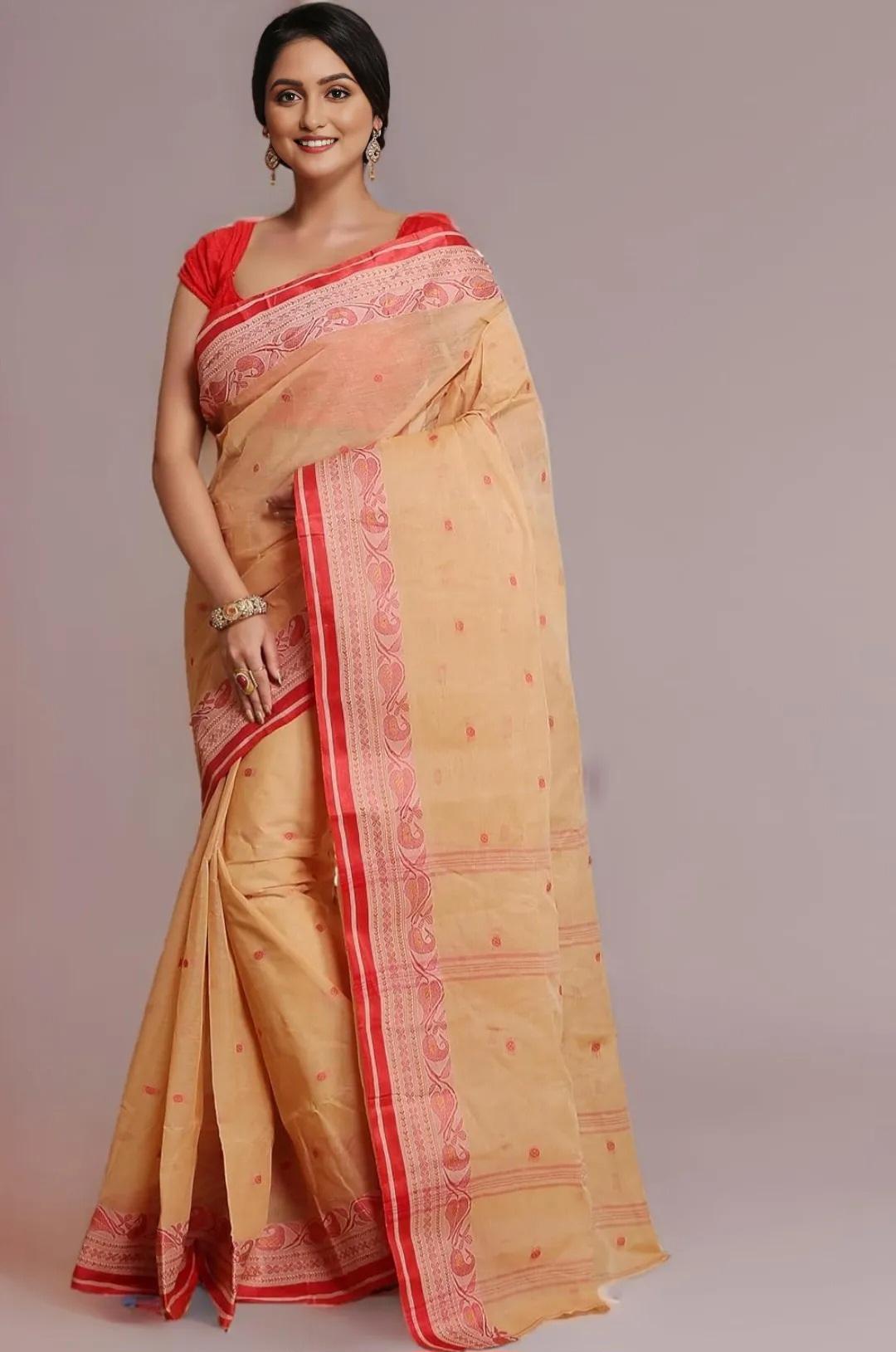 Classic Peach-Beige Tant Saree with Traditional Red Woven Border – Pure Handloom Cotton | Sutayan